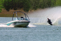 Waterskier and boat, CA